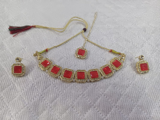 Prikasa pearl red and golden kundan choker set with earrings and maang tika - M32