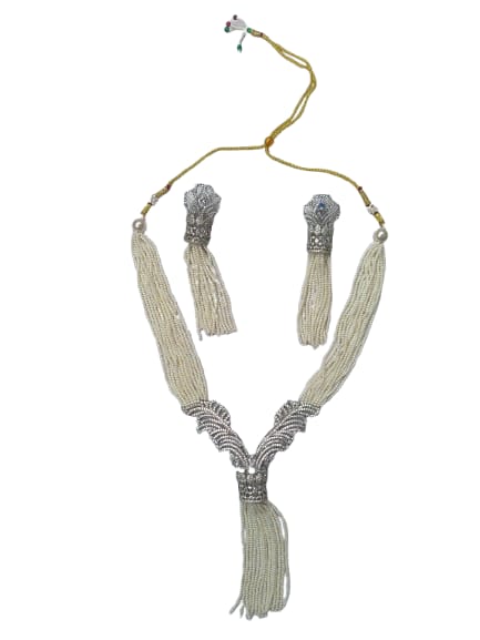 Elegant White Beaded Long Necklace with Ornate Silver Detailing & Tassel Earrings