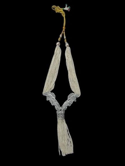 Elegant White Beaded Long Necklace with Ornate Silver Detailing & Tassel Earrings
