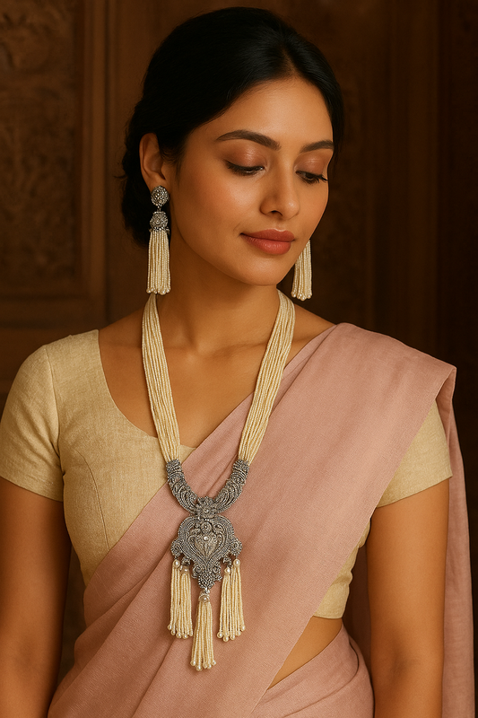 Elegant White Beaded Long Necklace with Ornate Silver Detailing & Tassel Earrings